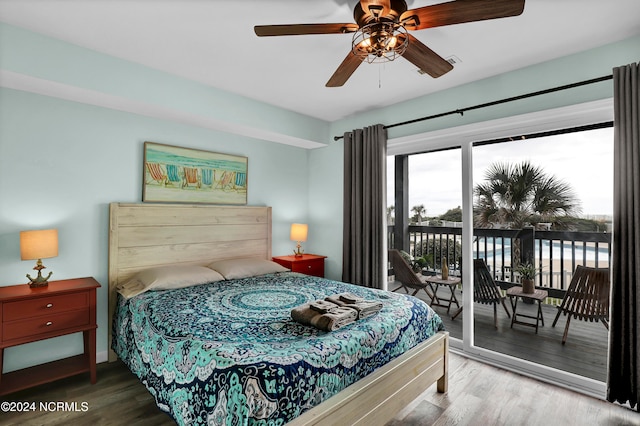 bedroom featuring ceiling fan, hardwood / wood-style flooring, and access to exterior