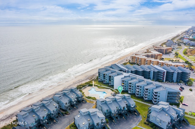 aerial view featuring a water view and a view of the beach