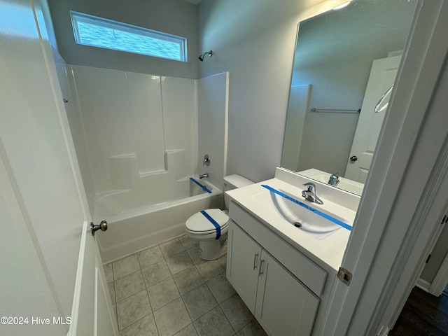 full bathroom with vanity, toilet, shower / bath combination, and tile patterned flooring