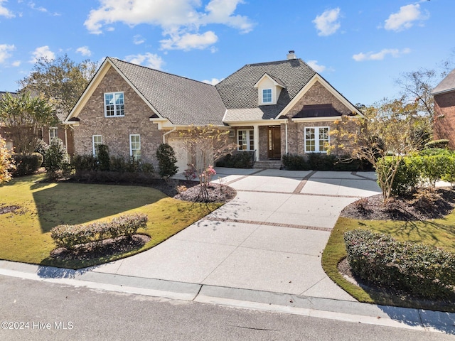 view of front of house with a front lawn