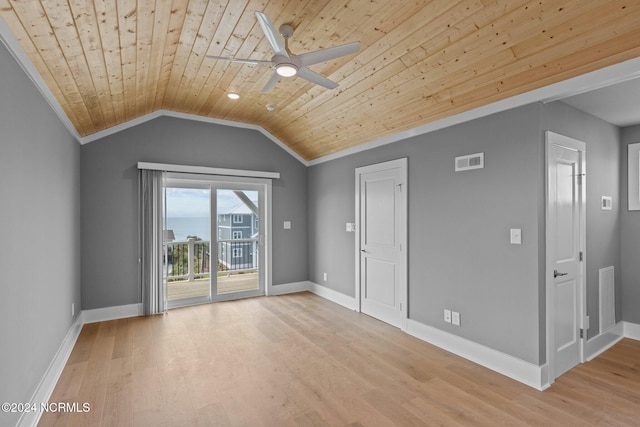 spare room featuring crown molding, light wood-type flooring, vaulted ceiling, wooden ceiling, and ceiling fan