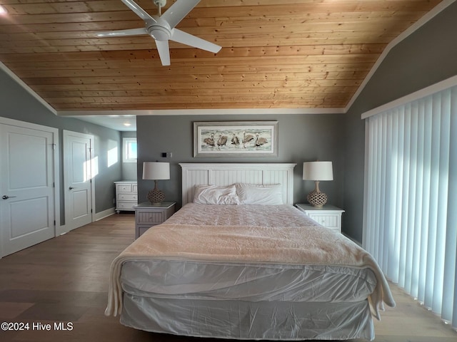 bedroom with wood-type flooring, ceiling fan, vaulted ceiling, and wooden ceiling