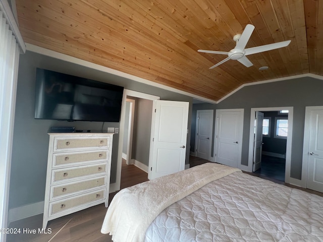 bedroom with lofted ceiling, wood-type flooring, wooden ceiling, and ceiling fan