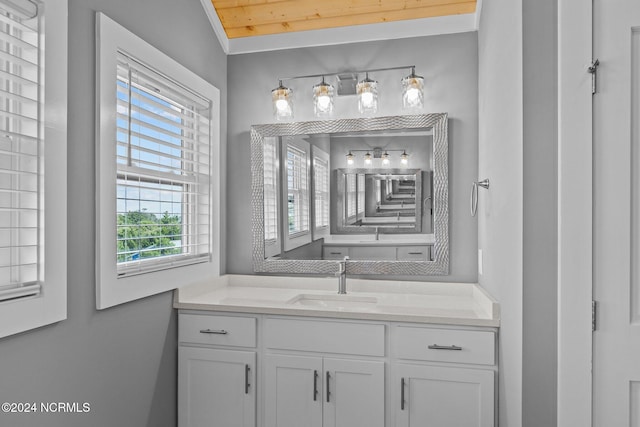 bathroom with vanity, vaulted ceiling, and wooden ceiling