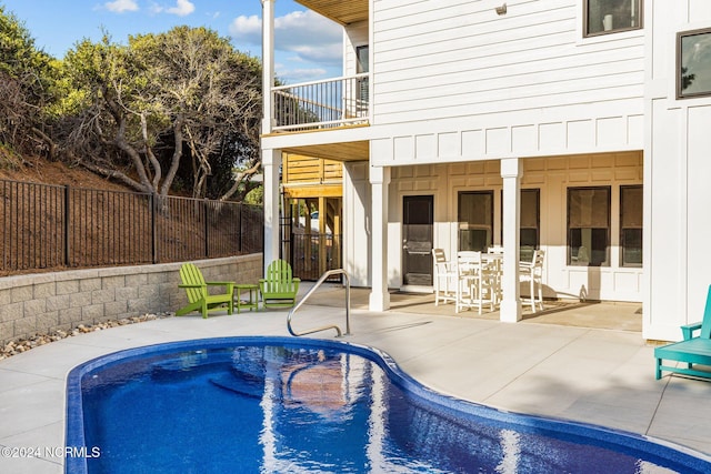 view of pool with a patio