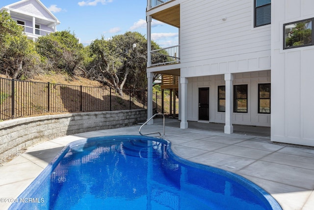 view of pool with a patio