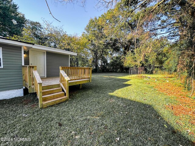 view of yard featuring a deck