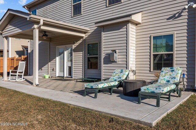 view of yard with a patio and ceiling fan