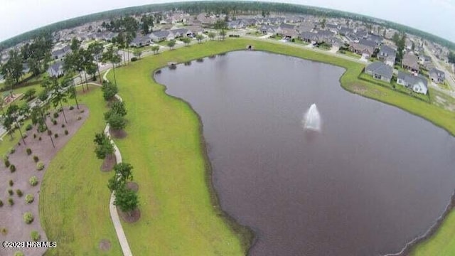 aerial view featuring a residential view and a water view