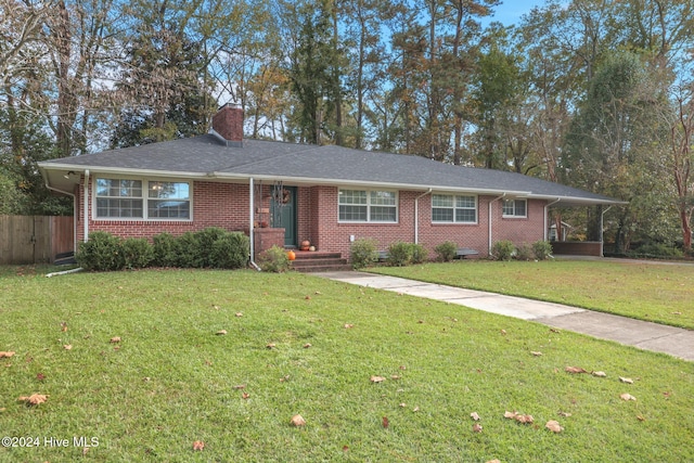 ranch-style home with a front yard