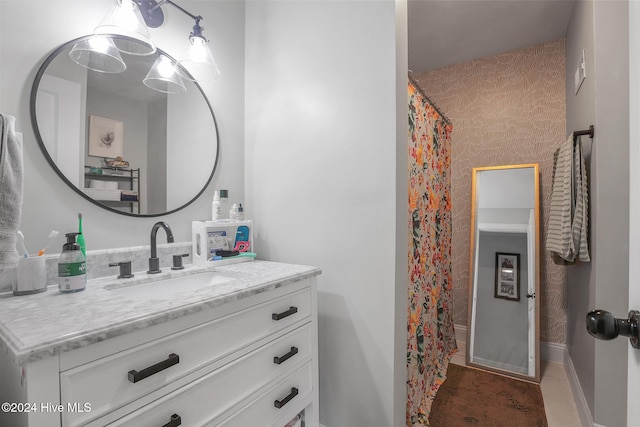 bathroom with vanity, tile patterned floors, and a shower with curtain