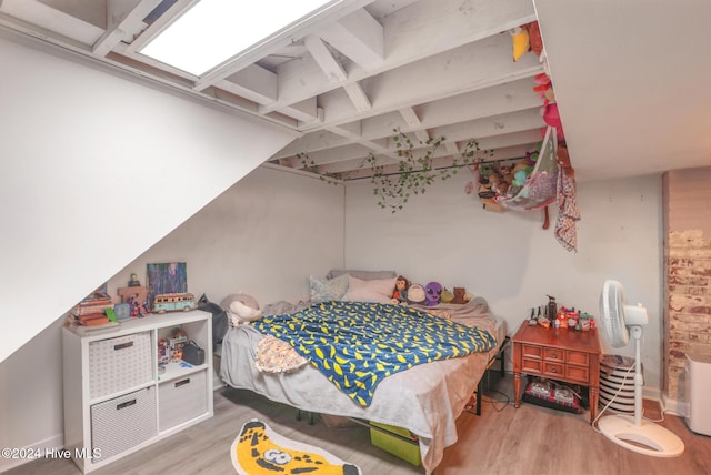 bedroom featuring wood-type flooring