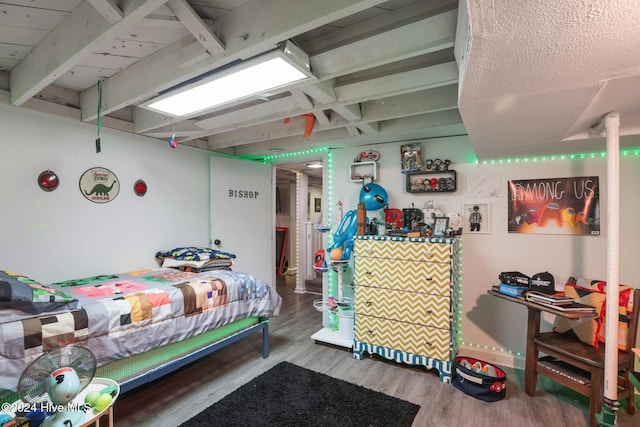 bedroom featuring wood-type flooring