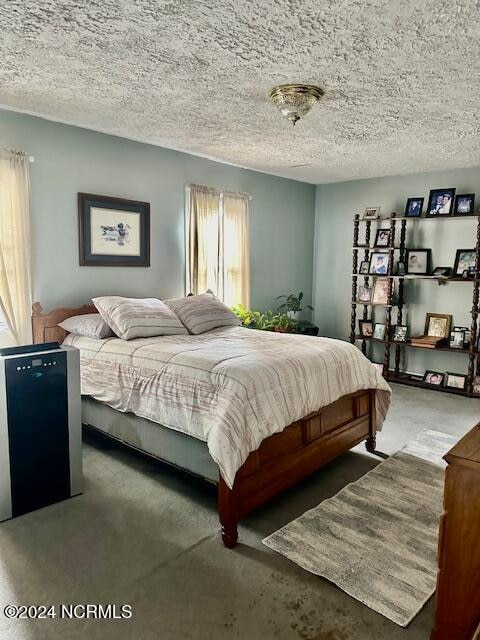 bedroom with a textured ceiling