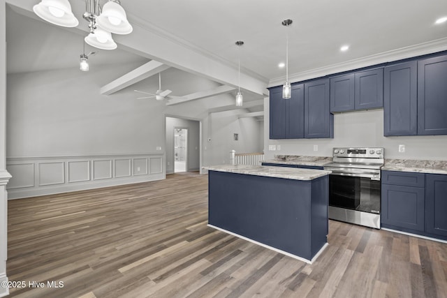 1552 Windsong Dr SW, Ocean Isle Beach, NC 28469 - kitchen featuring stainless steel range with electric cooktop, a center island, blue cabinets, a ceiling fan, and ornamental molding