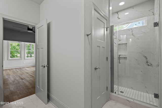 1552 Windsong Dr SW, Ocean Isle Beach, NC 28469 - full bath featuring marble finish flooring, a marble finish shower, and baseboards