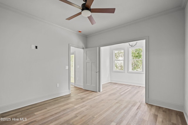 1552 Windsong Dr SW, Ocean Isle Beach, NC 28469 - unfurnished room with crown molding, a ceiling fan, light wood-style flooring, and baseboards