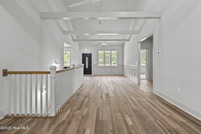 1552 Windsong Dr SW, Ocean Isle Beach, NC 28469 - hallway featuring wood finished floors and beam ceiling