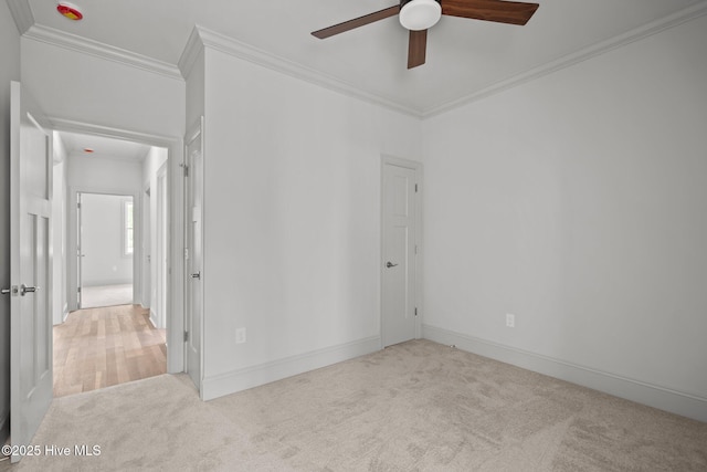 1552 Windsong Dr SW, Ocean Isle Beach, NC 28469 - carpeted spare room featuring ceiling fan, ornamental molding, and baseboards