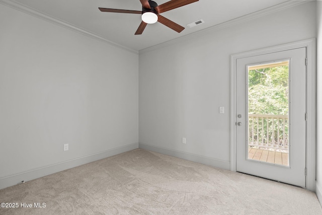 1552 Windsong Dr SW, Ocean Isle Beach, NC 28469 - carpeted spare room featuring ceiling fan, crown molding, and baseboards