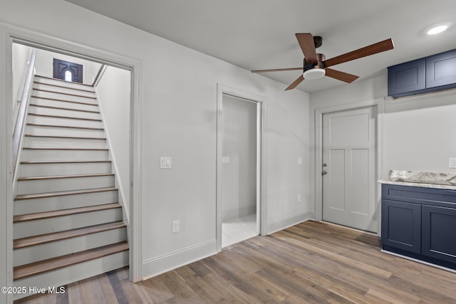 1552 Windsong Dr SW, Ocean Isle Beach, NC 28469 - interior space with ceiling fan, wood finished floors, stairs, and baseboards