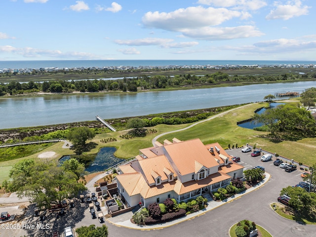 1552 Windsong Dr SW, Ocean Isle Beach, NC 28469 - drone / aerial view of a large body of water and a local golf course