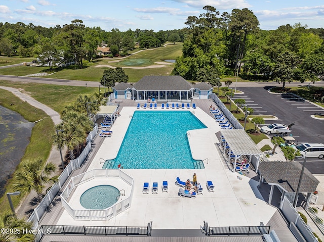 1552 Windsong Dr SW, Ocean Isle Beach, NC 28469 - community pool featuring view of scattered trees and golf course view