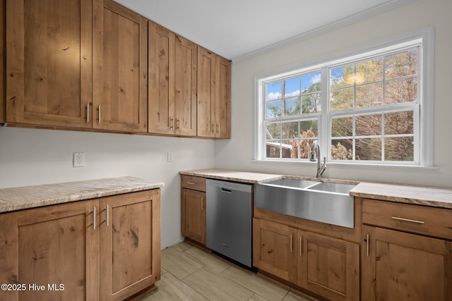 kitchen with sink, a wealth of natural light, stainless steel dishwasher, and crown molding