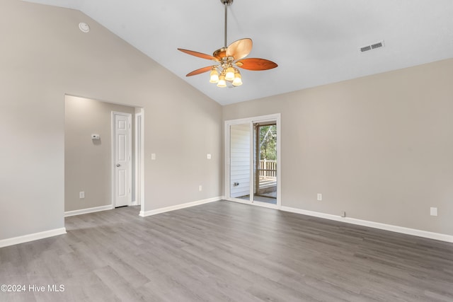 unfurnished room featuring light hardwood / wood-style floors, high vaulted ceiling, and ceiling fan