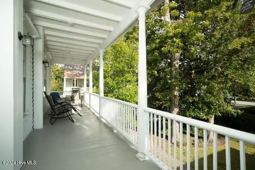 balcony featuring a porch