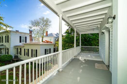 balcony featuring a porch