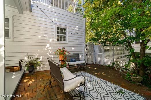 view of patio / terrace with a balcony