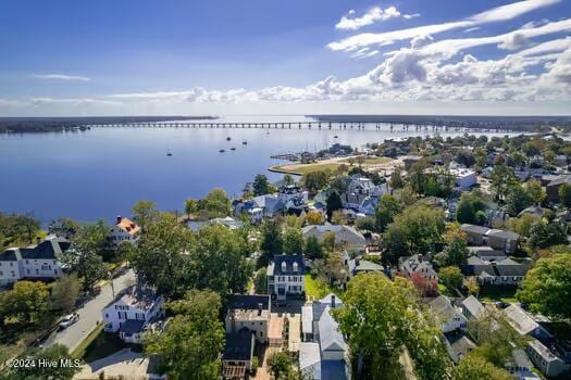 birds eye view of property featuring a water view