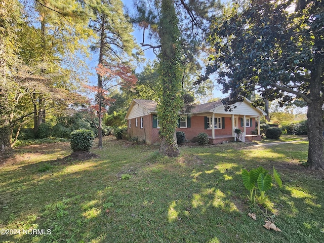 view of yard with a porch