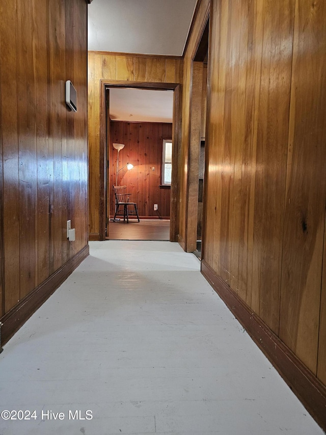 hallway with wooden walls