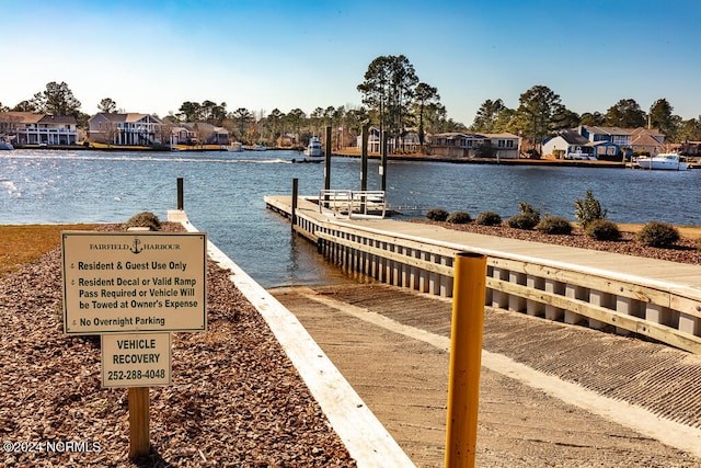 view of dock with a water view