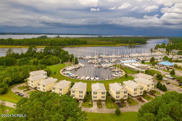 birds eye view of property featuring a water view