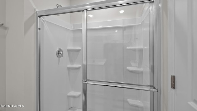 bathroom featuring a shower stall