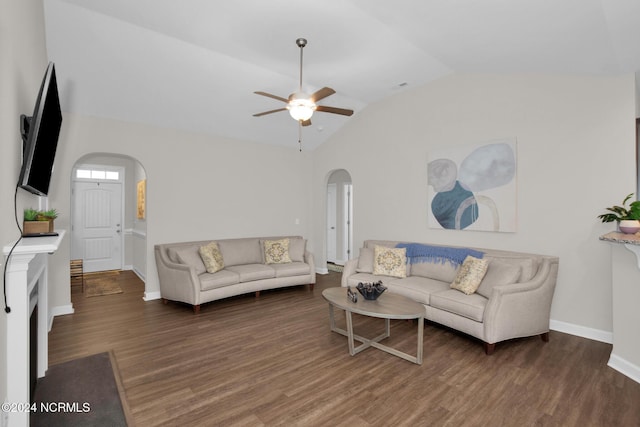 6639 Ramsey St, Fayetteville, NC 28311 - living room featuring arched walkways, lofted ceiling, wood finished floors, and a ceiling fan
