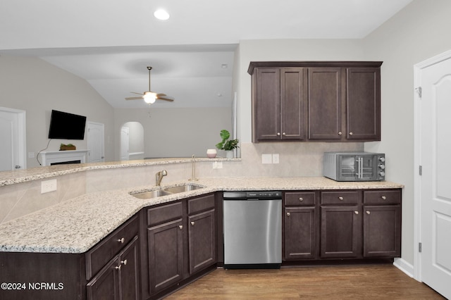 6639 Ramsey St, Fayetteville, NC 28311 - kitchen with dishwasher, wood finished floors, decorative backsplash, ceiling fan, and dark brown cabinets
