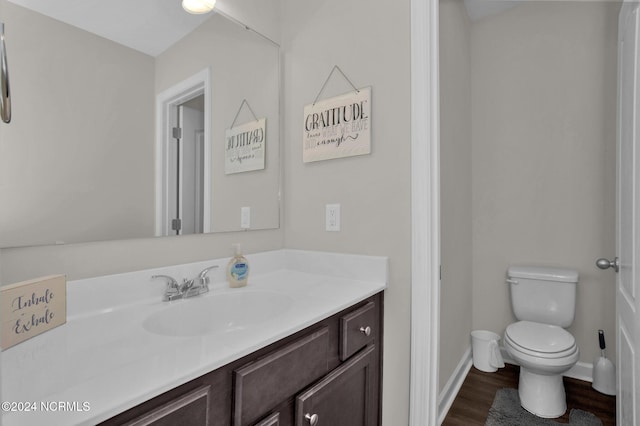 6639 Ramsey St, Fayetteville, NC 28311 - bathroom with vanity and wood finished floors