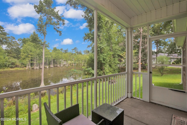 6639 Ramsey St, Fayetteville, NC 28311 - sunroom / solarium featuring a water view