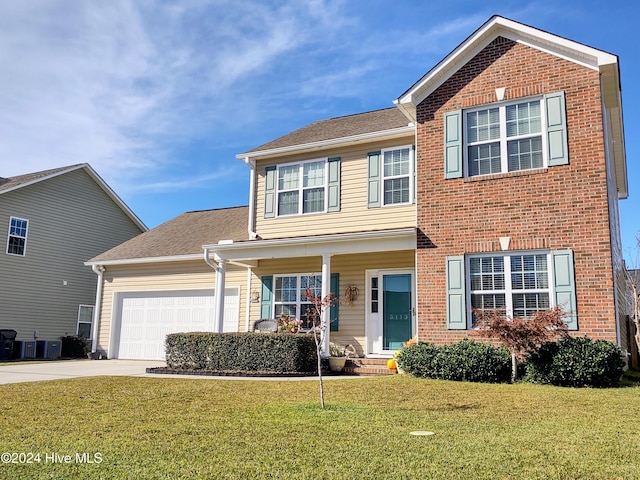 view of front facade with a front lawn, a garage, and central air condition unit