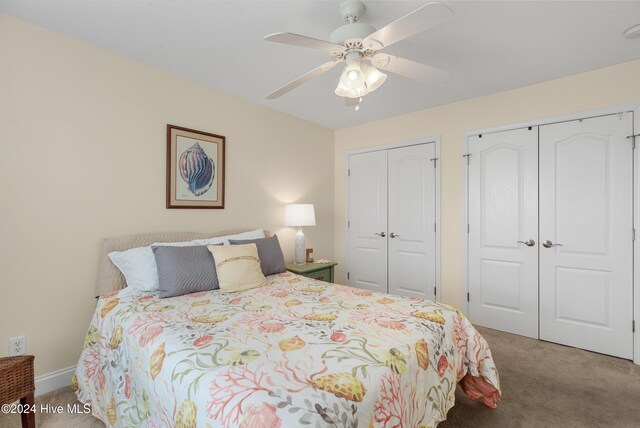 bedroom with ceiling fan and carpet flooring