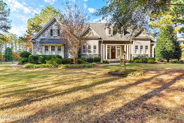 view of front of property with a front lawn