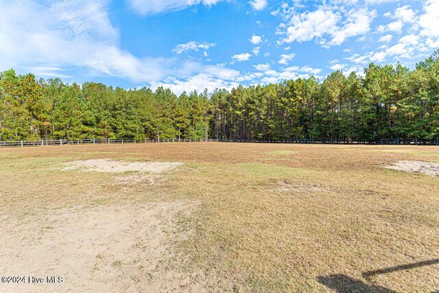 154 Horizon Trl, Aberdeen, NC 28315 - view of yard with a forest view and an enclosed riding area