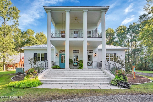 back of house with a balcony