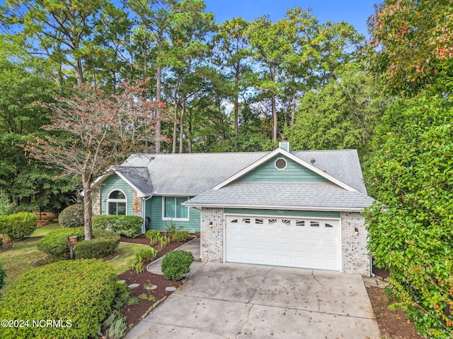 single story home with a garage