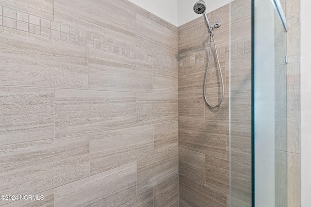 room details with a tile shower