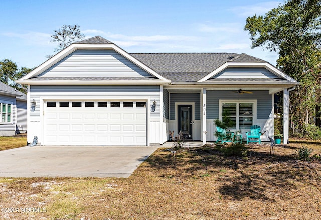 view of front of house with ceiling fan, a porch, and a garage